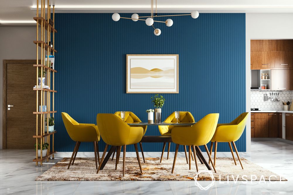 how-to-decorate-dining-room-with-blue-accent-wall-yellow-chairs-rug-partition