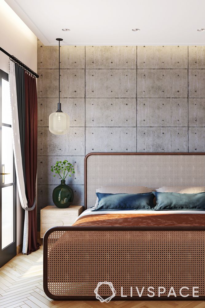 grey-fabric-wall-panelling-rattan-weaved-headboard-parquet-floors