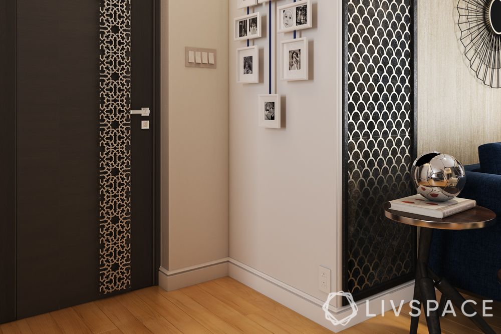 Foyer design-gallery wall-black and white-metallic accents
