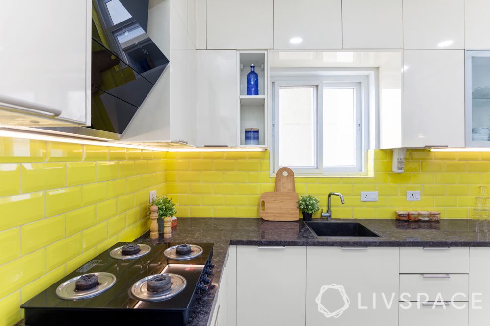 modular-kitchen-price-white-cabinets-yellow-backsplash