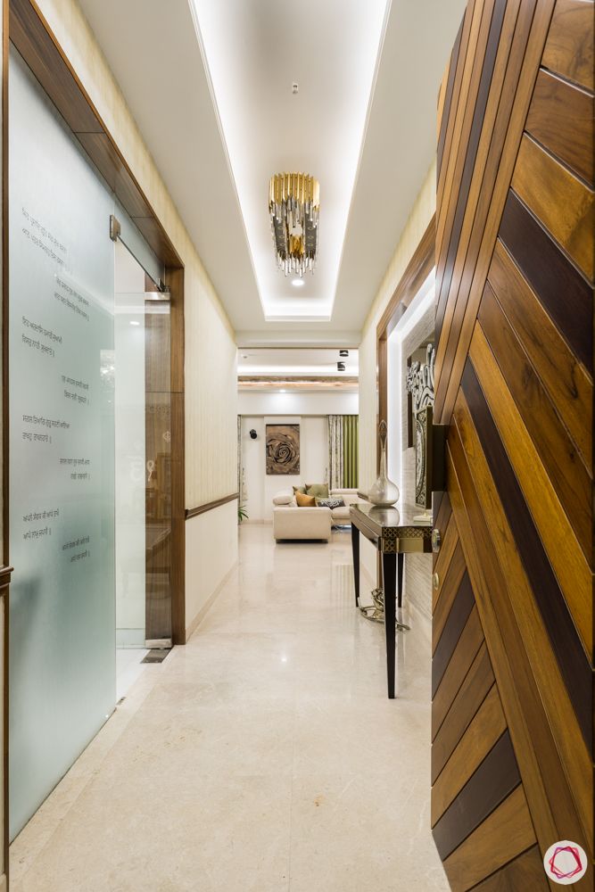 DLF-capital-greens-foyer-pooja-glass-door-false-ceiling-chandelier 