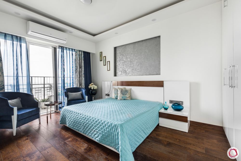 DLF Capital Greens-bedroom-blue-wardrobe-lofts-wall-niche-wooden-flooring