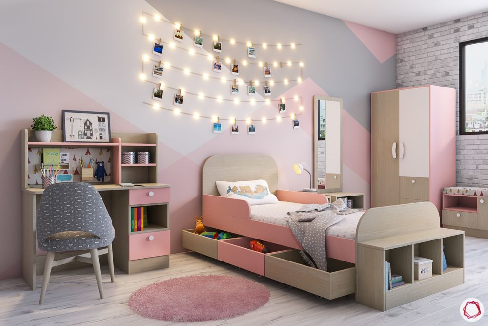 Children’s bedroom colours-pink accent wall-bed with storage-fairy lights-study unit