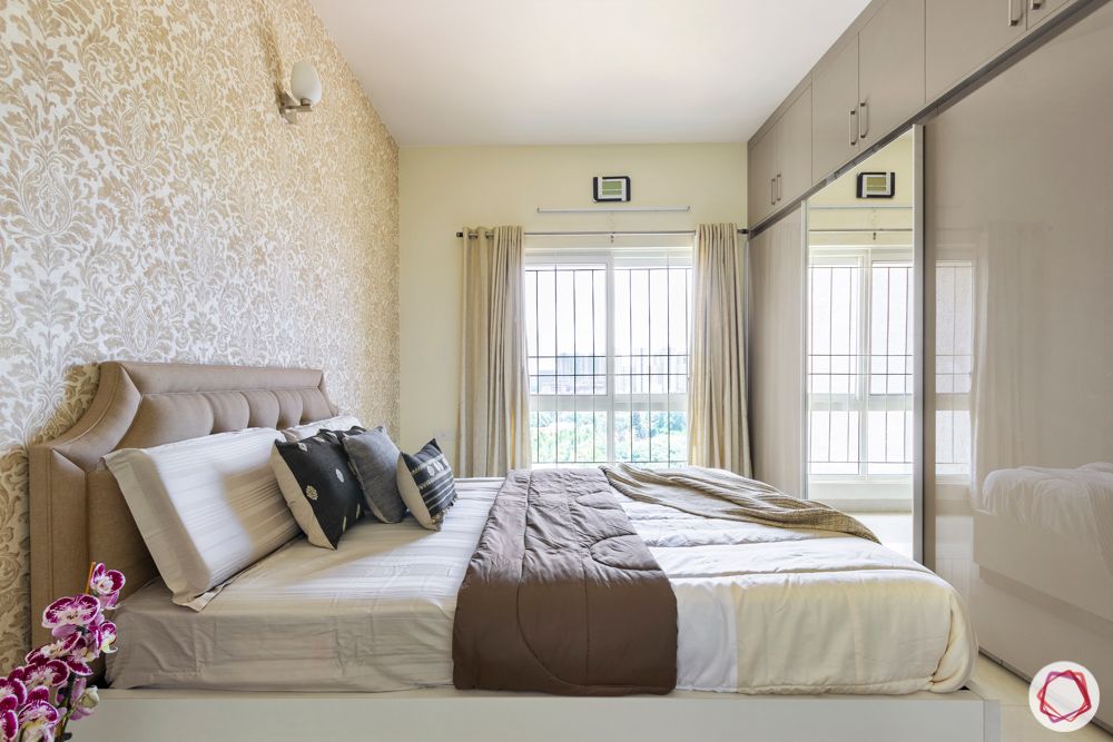 guest-bedroom-neutral-headboard-window-bright-wardrobe-mirror