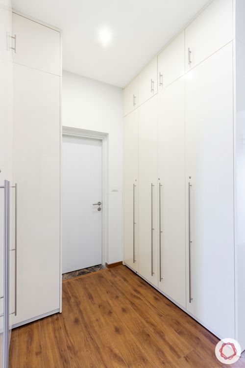 wooden floor designs-white walk-in closet-floor to ceiling wardrobes
