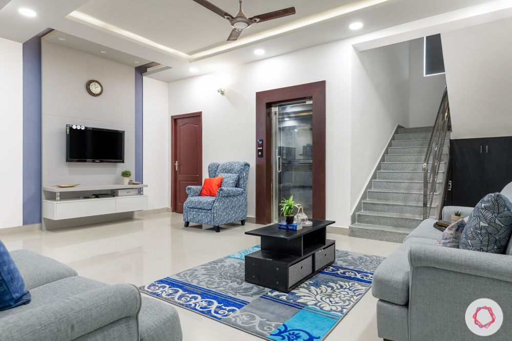 top interior designers in hyderabad-living room-wooden frame-grey sofa designs-coffee table