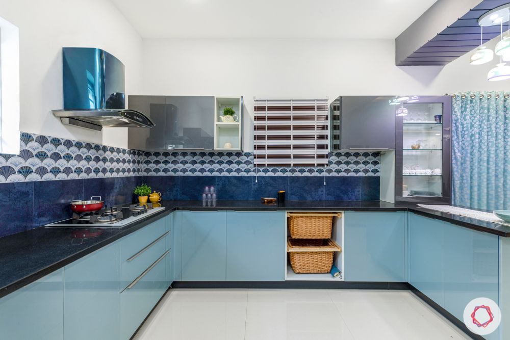 top interior designers in hyderabad-kitchen-grey and blue cabinets-blue backsplash