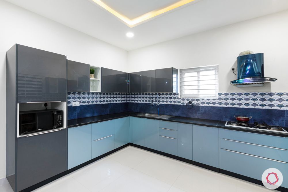 top interior designers in hyderabad-kitchen-grey and blue cabinets-blue backsplash