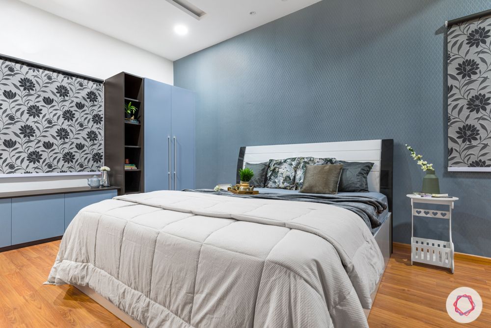 top interior designers in hyderabad-master bedroom-white bed-blue wardrobes-grey wallpaper