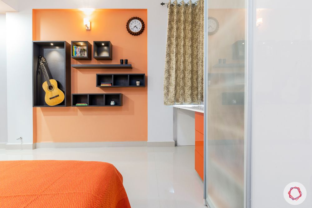 top interior designers in hyderabad-kids bedroom-white bed-orange acrylic wardrobes-orange wall paint