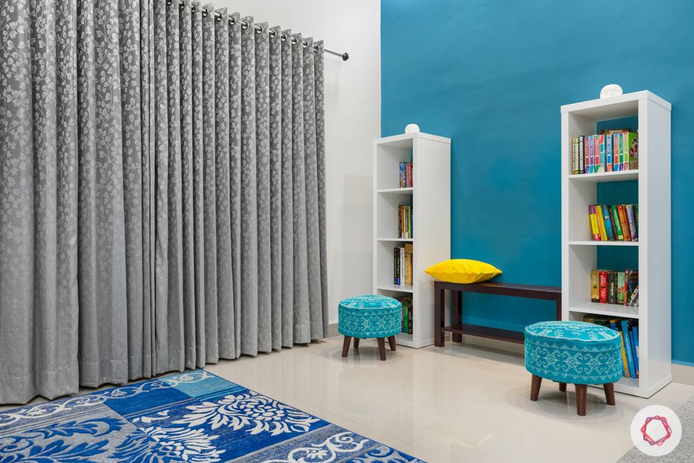 top interior designers in hyderabad-grey and blue theme-lighting-bookshleves