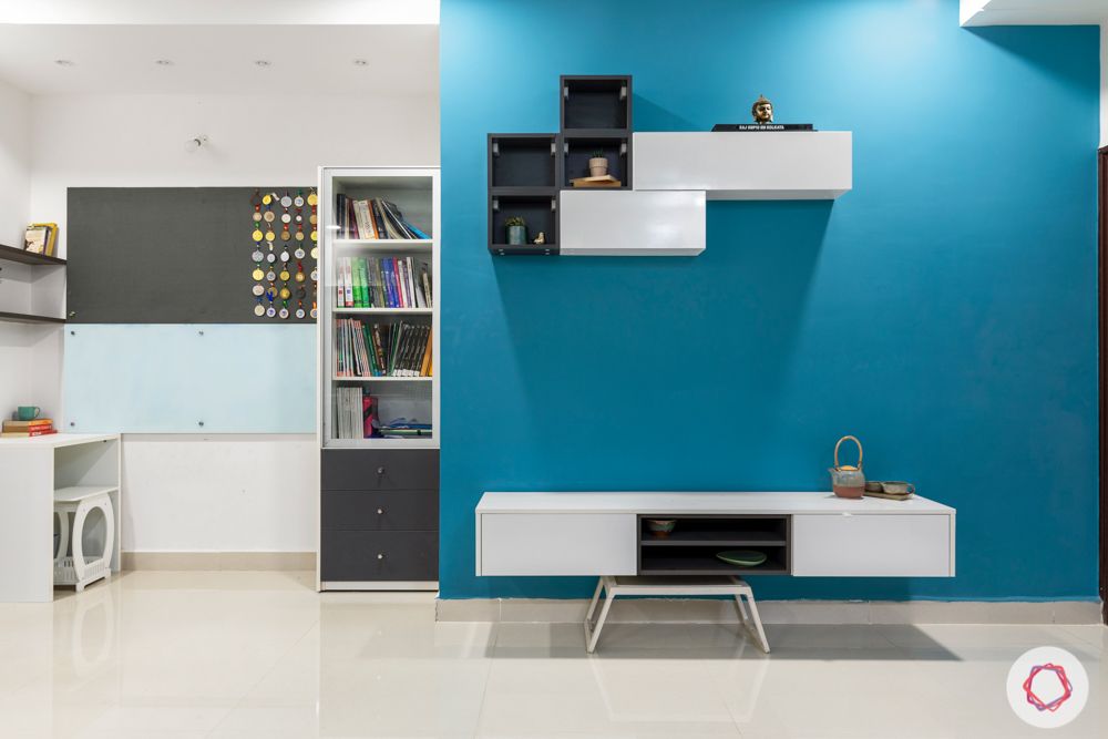 grey and blue theme-lighting-bookshleves-Tv unit