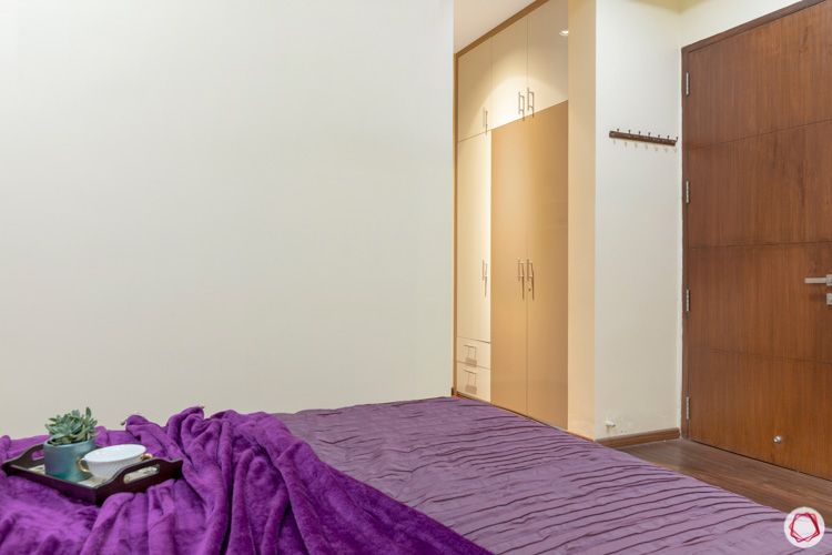 interior design in hyderabad-master bedroom-wardrobe-nook-dual colours-white membrane wardrobe