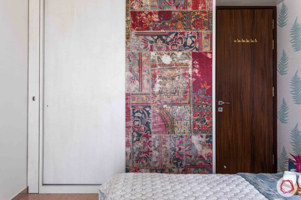 livspace wardrobe design-red wardrobe-morrocan pattern-white door