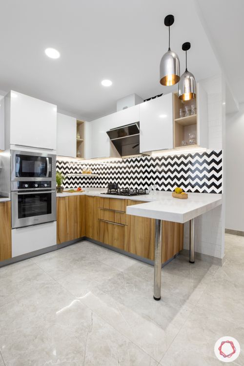 Livspace kitchen-open kitchen design-zigzag backsplash-pendant lights-tall unit