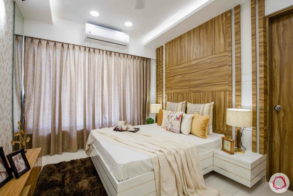 low budget home design-wood frame bed-neutral bedding