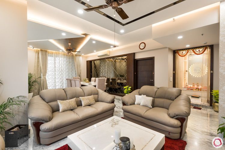 4 bhk flat-living room layout-pooja room designs-sofa designs-false ceiling