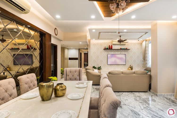 4bhk flat-dining room-dining table set-eight seater-cushioned chairs-neutral dining room