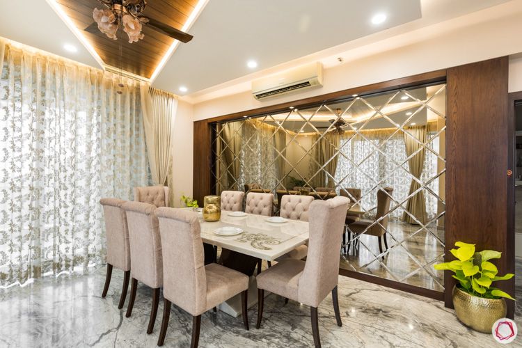4 bhk flat-8 seater table-mirror panel-ceiling design