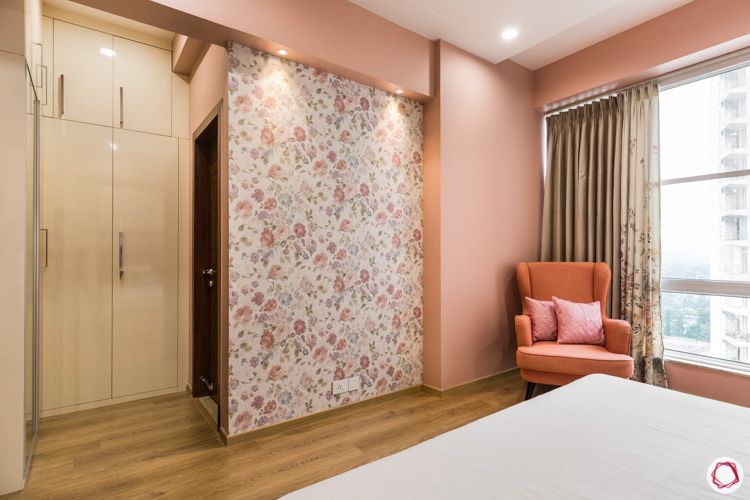 4 bhk flat-floral wallpaper-glossy wardrobes-pink armchair-pink wall