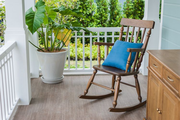 types-of-chairs-rocking-wood-patio-plant-white-railing