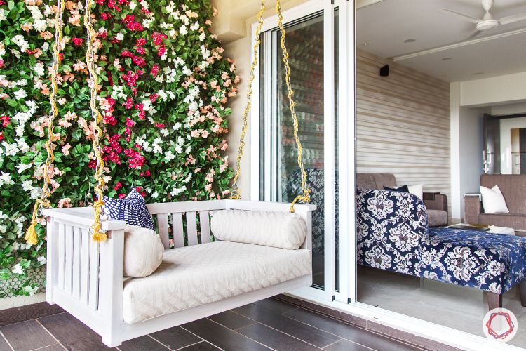 outdoor balcony design-white daybed swing-swing designs-vertical garden