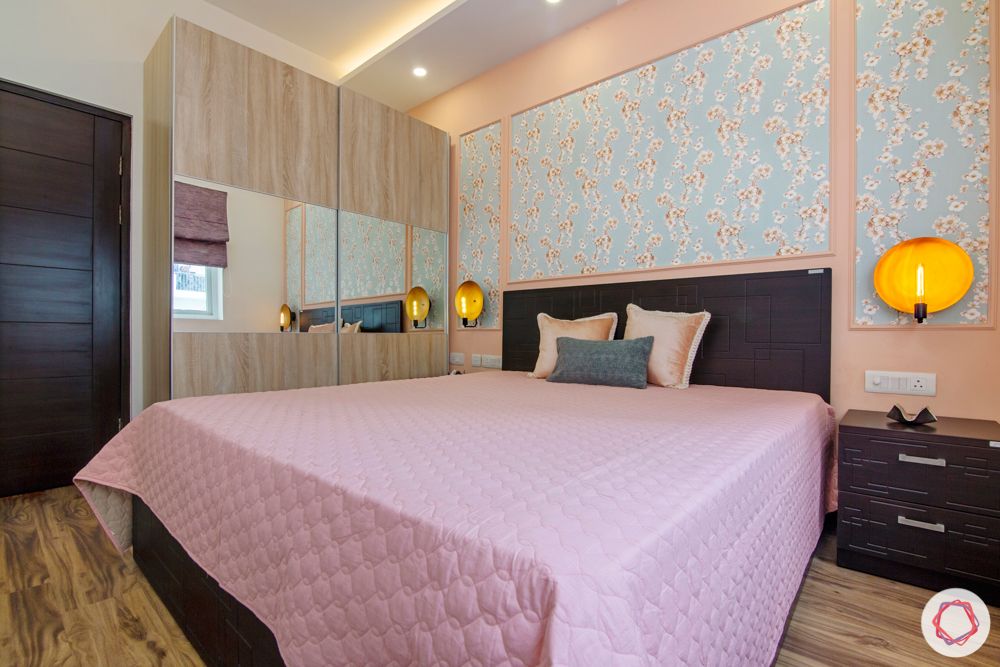 3 bhk interior design-Parents Bedroom-baby pink wall-blue floral wallpaper-mirror panel wardrobe
