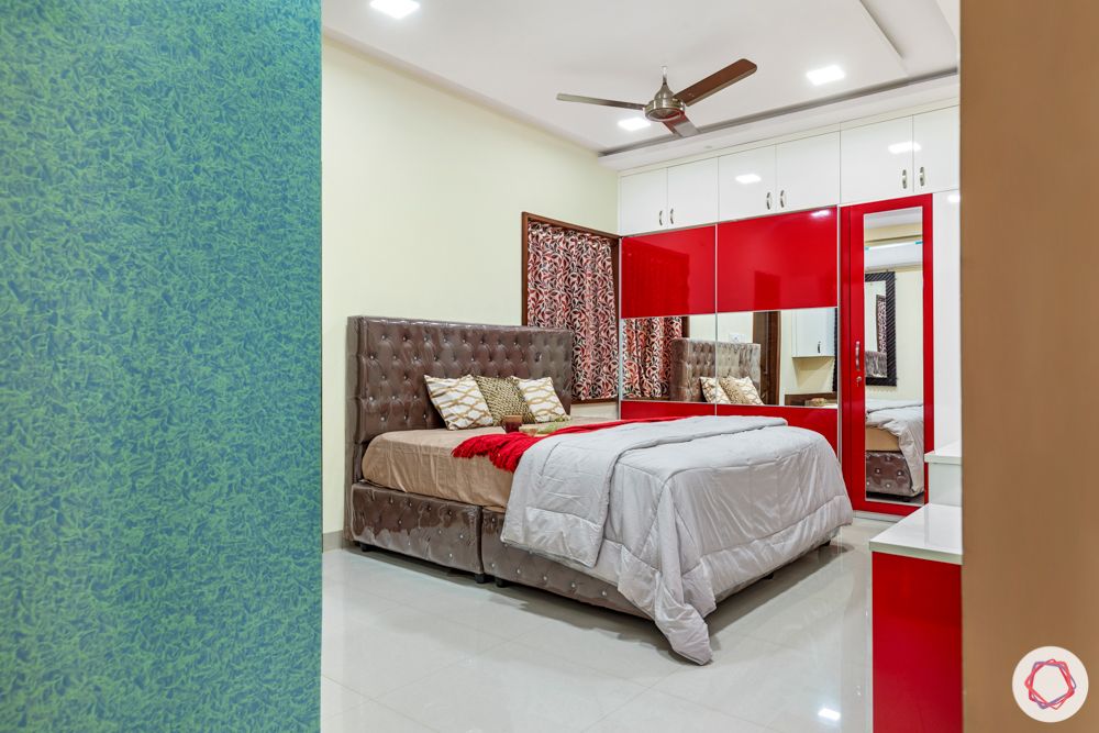 madhavaram serenity-Master Bedroom-red and white wardrobes-brown bed
