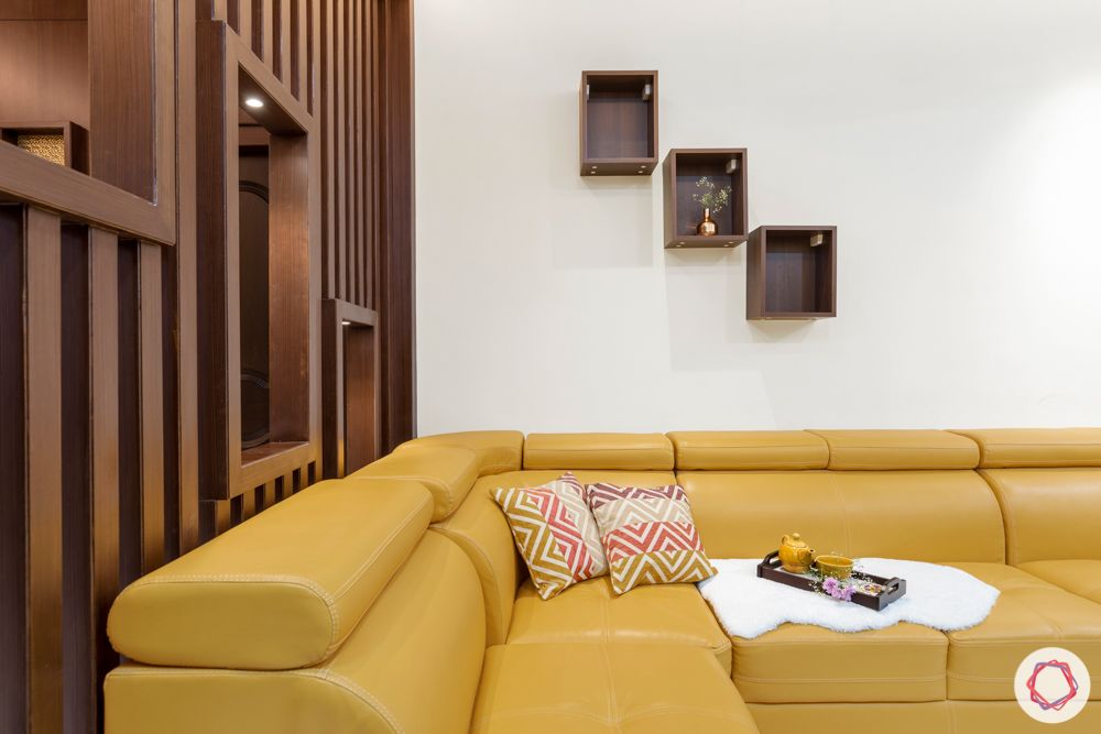 madhavaram serenity-living room-yellow sofa set-wooden partition-green and purple cabinets