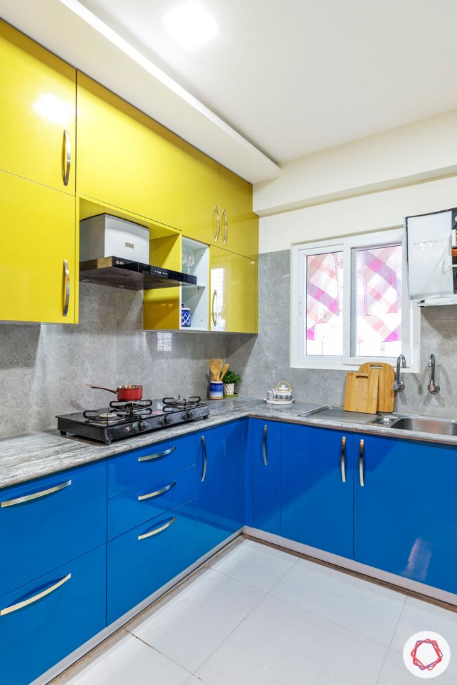 madhavaram serenity-kitchen-blue and yellow designs-tall unit-high gloss cabinets