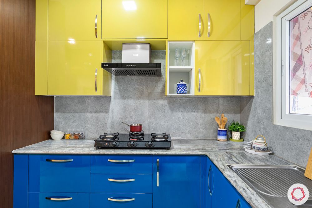 madhavaram serenity-kitchen-blue and yellow designs-tall unit-high gloss cabinets