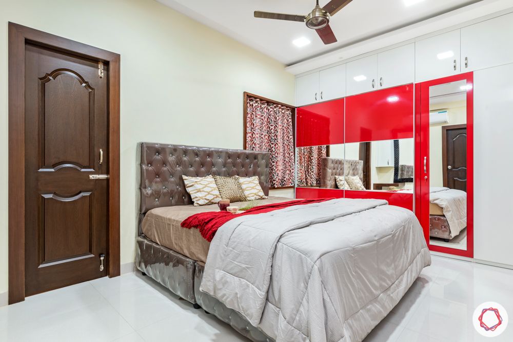 madhavaram serenity-Master Bedroom-red and white wardrobes-brown bed