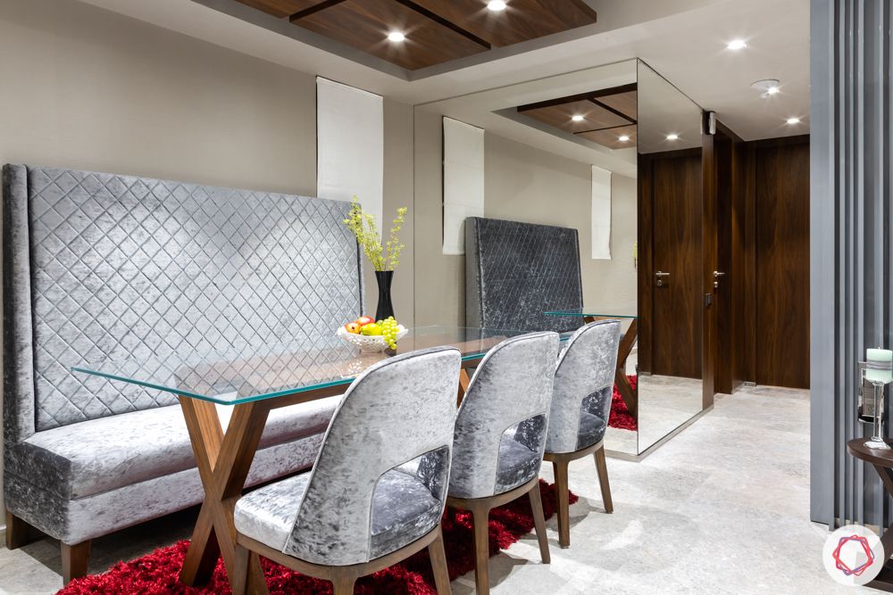 lodha-elisium-dining-room-high-back-bench-glass-wall-panels