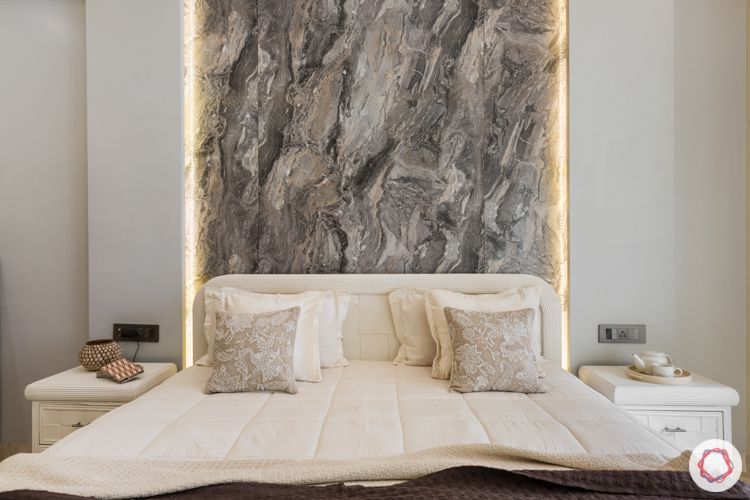marble wallpaper-white vintage bed-backlighting-white sideboards`