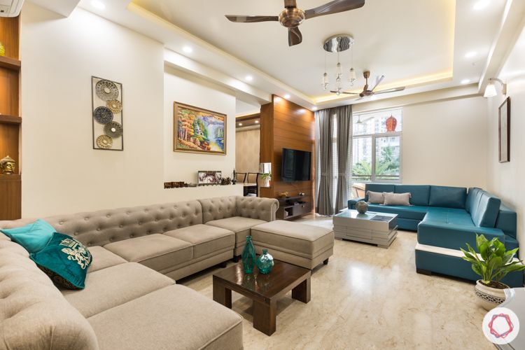 Beige suede sofa-stone clad wall-antique dresser-turquoise sofa-sectioned L shaped-leatherite