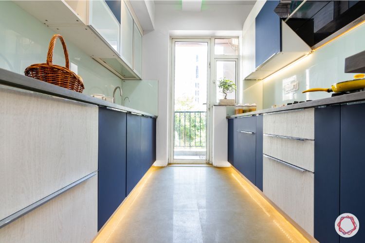 kitchen cupboard colours-blue-white-lights-under-groove-handles