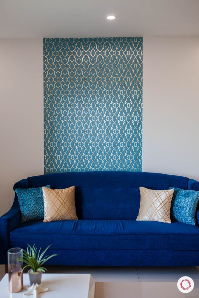 2-bhk-home-design-livspace-pune-living-room-blue-wallpaper