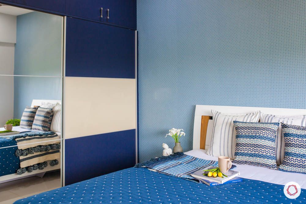 2-bhk-home-design-livspace-pune-bedroom-sliding-wardrobes