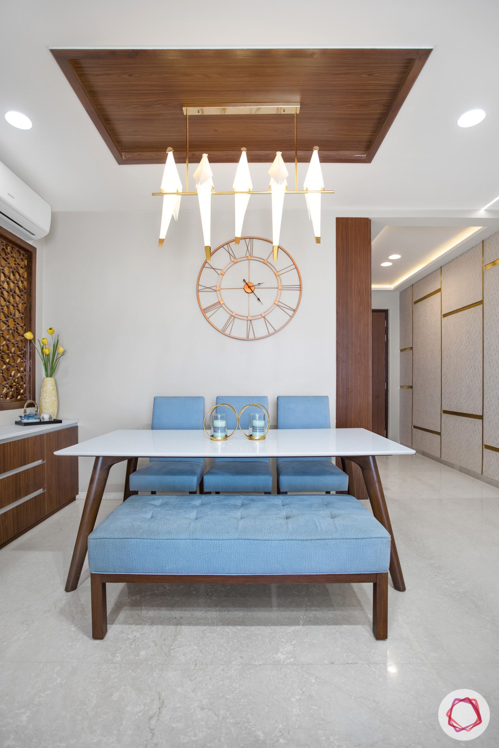 metal fixtures-wooden false ceiling-dining room lighting-clock design