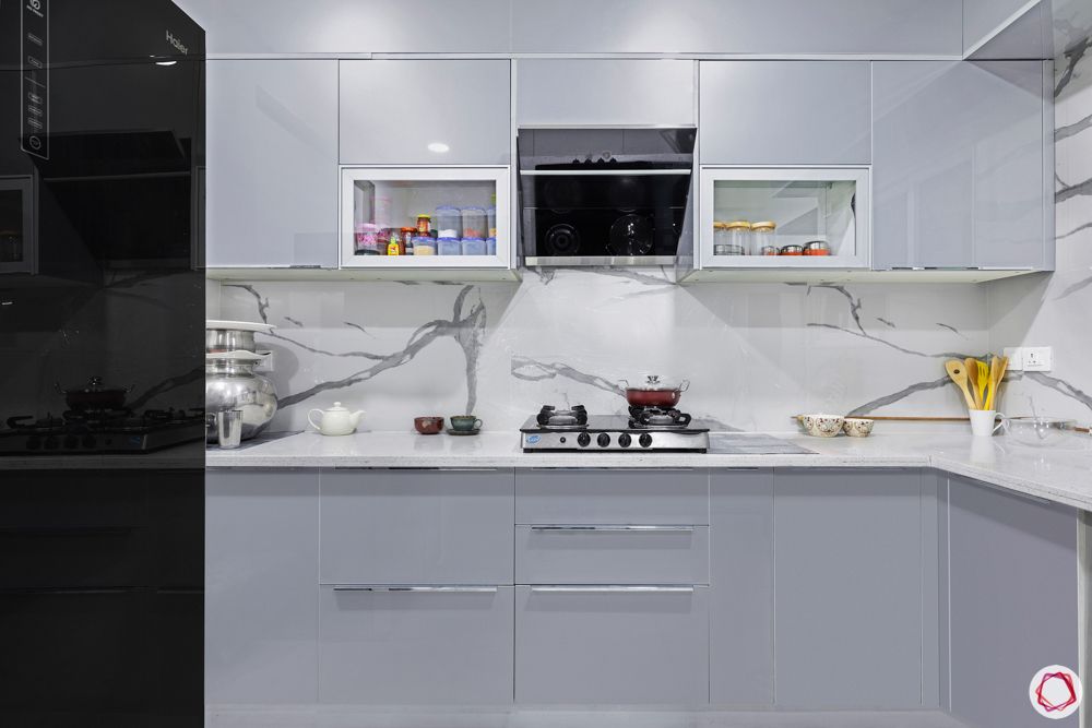 best interior designers in hyderabad-sleek grey kitchen-cabinets-marble backsplash