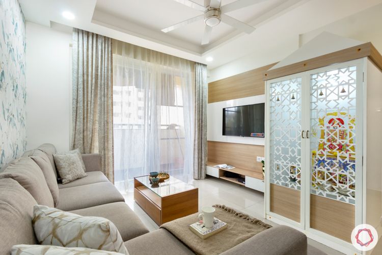 2 bhk flat interior design-living room-tv unit-pooja unit-walnut finish -grey sofa