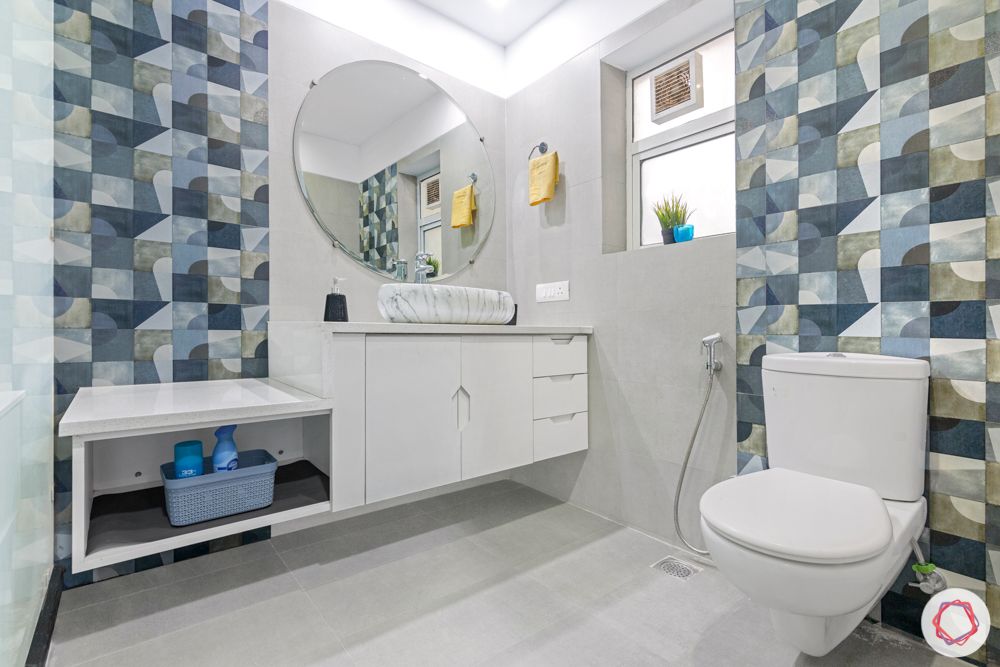  4 bhk home design-blue and grey tiles-bathroom cabinets