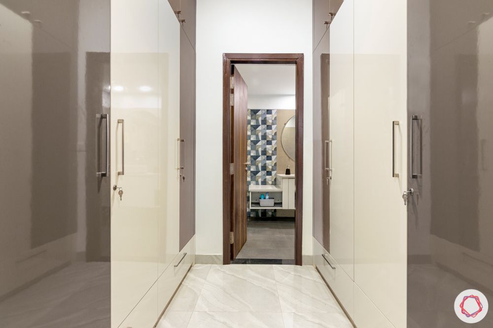  4 bhk home design-brown and white wardrobes-walk-in closet