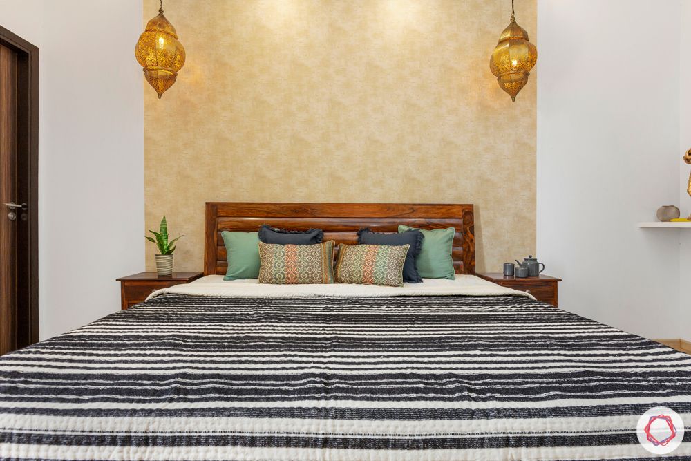  4 bhk home design-gold wallpaper-desi hanging lights-sheesham wood bed