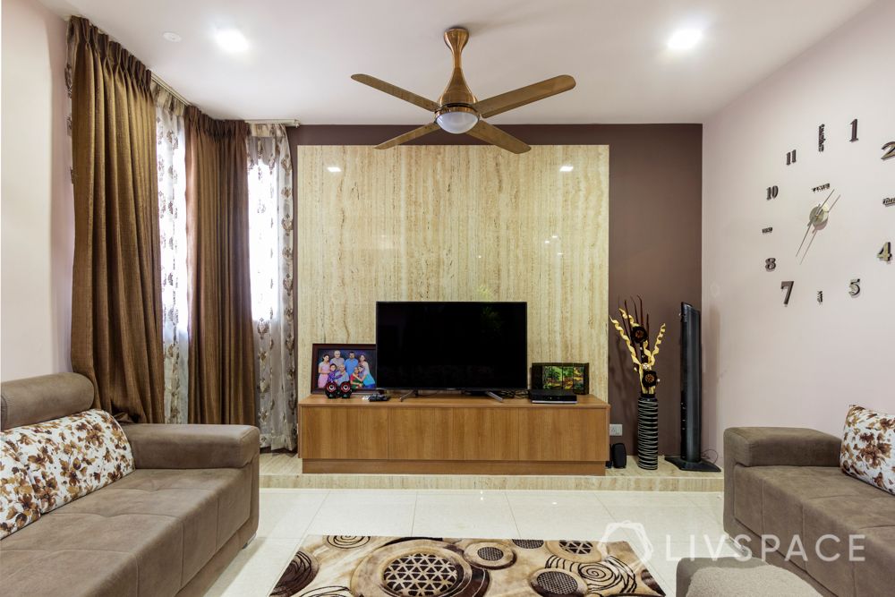 home-interior-designers-in-bangalore-prestige-bagamane-temple-bells-marble-finish-tv-unit