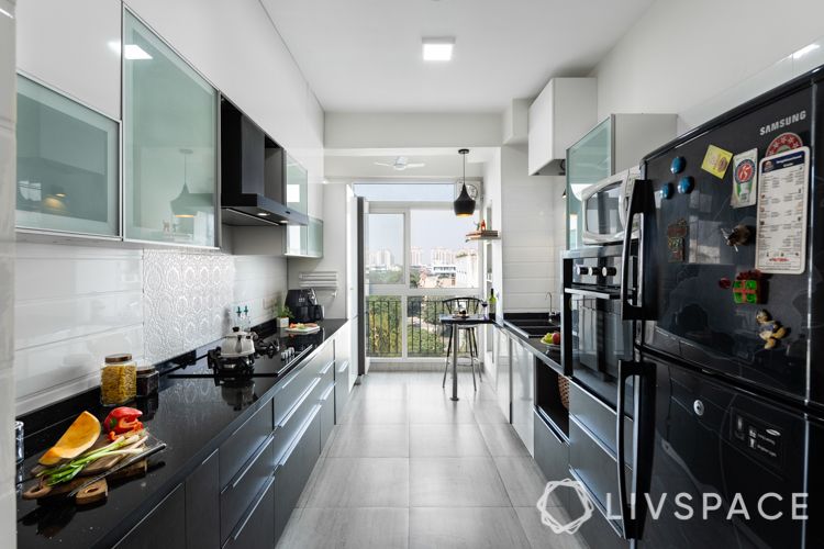 interiors in gurgaon-black and white kitchen-black quartz countertop