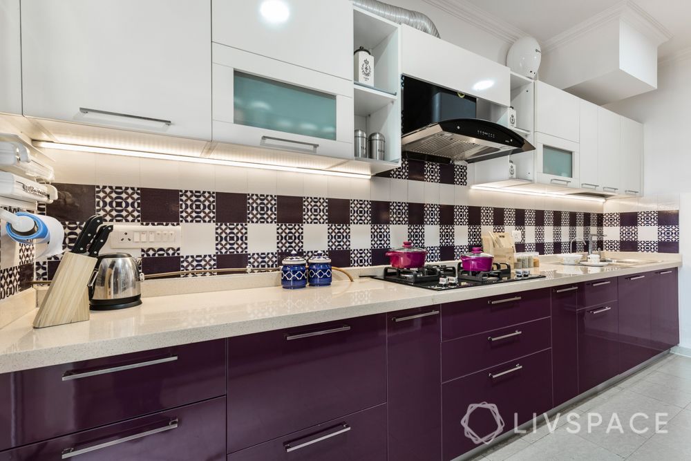 4 bhk in gurgaon-kitchen-patterned tiles-glossy laminate finish-white and purple