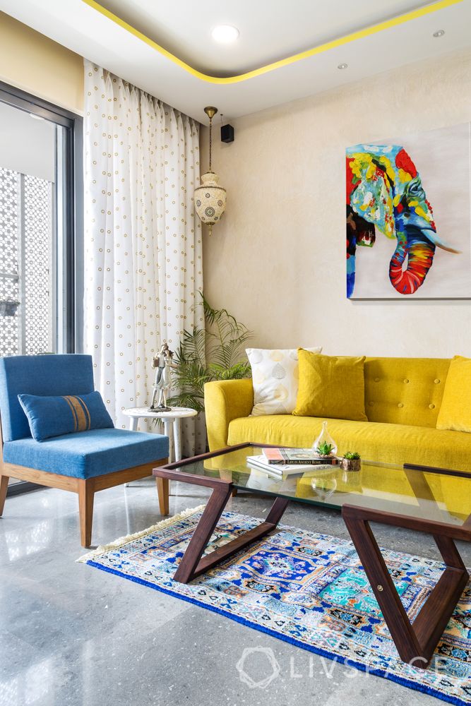 decorative items for living room-yellow sofa-blue chair-rug