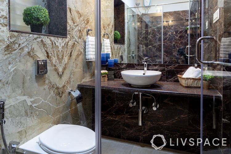 Small bathroom designs india-granite countertop-white basin-tile flooring