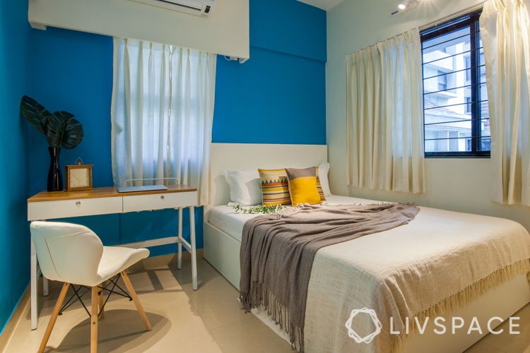 small house interior design-white bed-blue wall-white study unit design